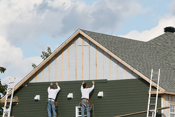 Professional Siding Installation technician working in Linwood, NC